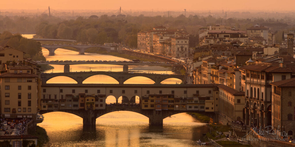 Ponte Vecchio bridge and Arno river in the evening. Florence, Italy.